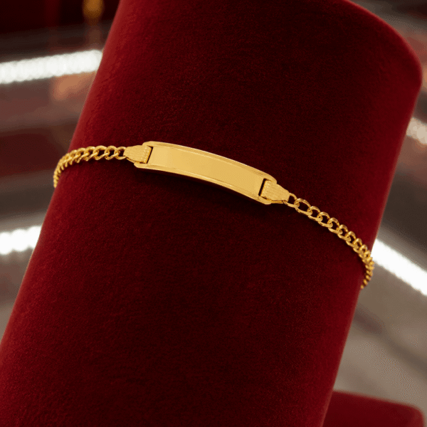 18K yellow gold ID bar bracelet mannequin view