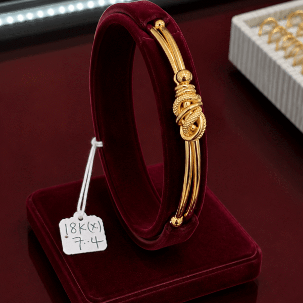 18K Gold Twisted Knot Bangle – 7.4g side view