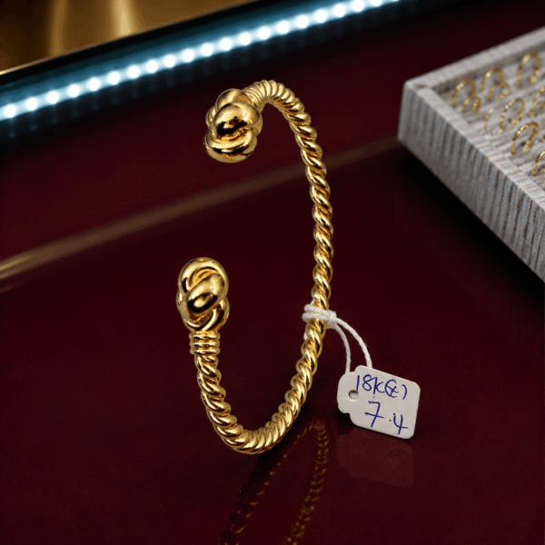 18K Gold Twisted Knot Bangle – 7.4g