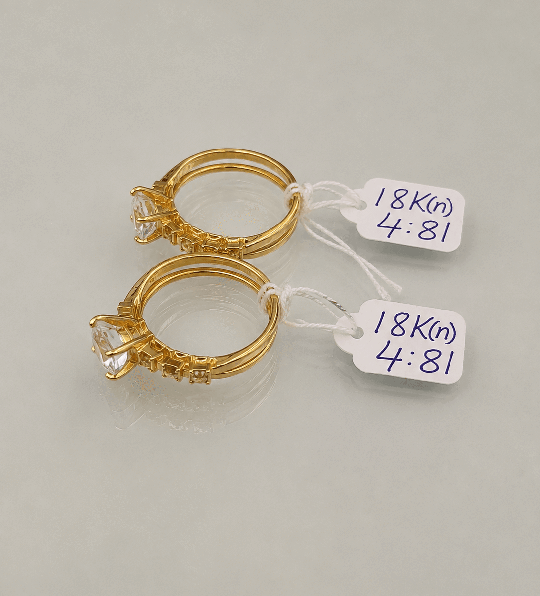 18K Gold Solitaire Ring Pair – 4.81g Each